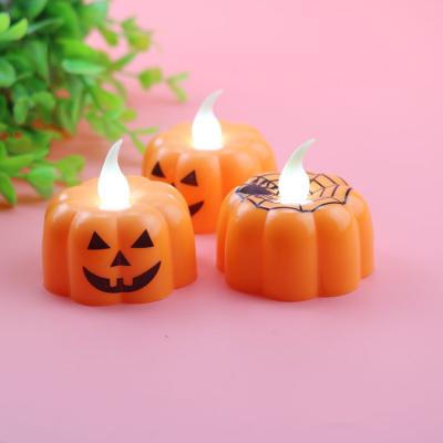 China Country Smiley Pumpkin Candle Light Creative Luminous Decoration Props Halloween Toys for sale