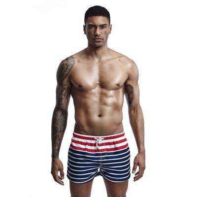 China Breathable Swimming Suit For Men Diving Men's Bath Shorts Sexy Transparent Print Trunk Fitness Waist Tops Swimsuit Men Swimwear for sale