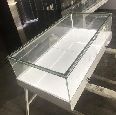 China MDF Tempered Glass And White Painting Jewelry Display Showcase With Projector And LED Strip Light for sale