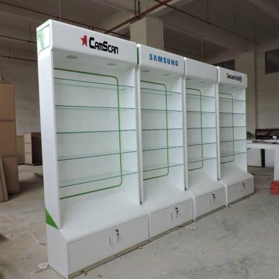 China Durable Customized Store Customizing Slat Wooden Wall LED Light Display Cabinet Lockable Display Furniture for sale