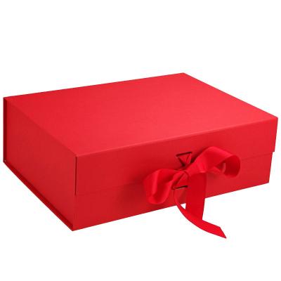 China Biodegradable Unique Luxury Packaging Boxes Folding Pink Paper Gift Box With Magnetic Lid for sale