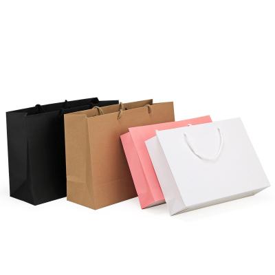 China Recyclable Fine Quality Customizable Colors Shopping Carry Gift Cheap Paper Bag With Handles for sale