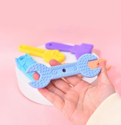 China Soft Toy Newest 4 Pack Hammer Wrench Vise Shape Teether Toys BPA Free Chew Toys Baby Food Grade Silicone Teether for sale