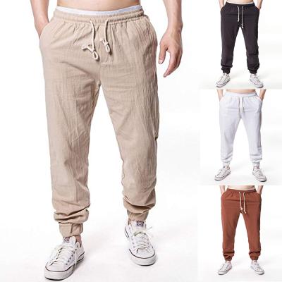 China Men's Breathable Gaiters Casual Pants Cotton Hemp Tie Rope Solid Color Elastic Waist Sports Pants 2020 Europe and America for sale