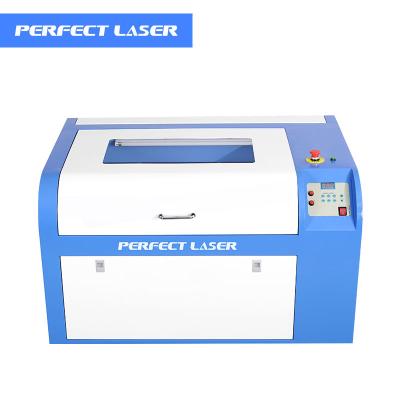 China Laser Engraving High Precision Factory Price CO2 Laser Engraving Rubber Stamps 60w 6040 Rubber Stamp Making Machine for sale