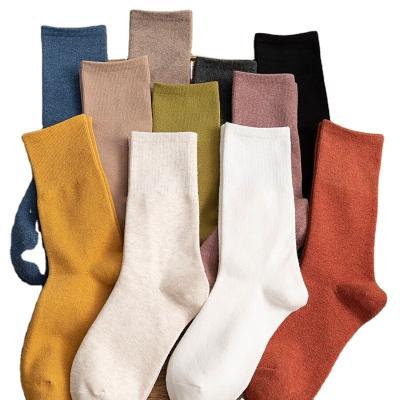 China Polyester Customized womens long socks absorb sweat and breathable color wholesale sports womens socks for sale