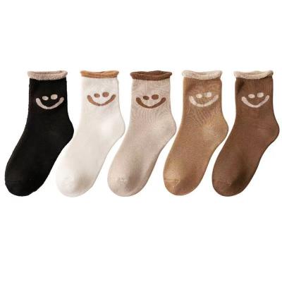 China Thickened polyester winter women's socks and crew wholesale women's warm buckle floor socks woolen socks for sale