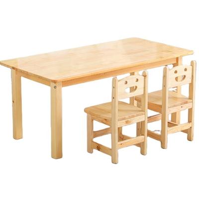 China Modern Wooden Easy Children's Kindergarten Desks And Chairs For Boys And Girls for sale