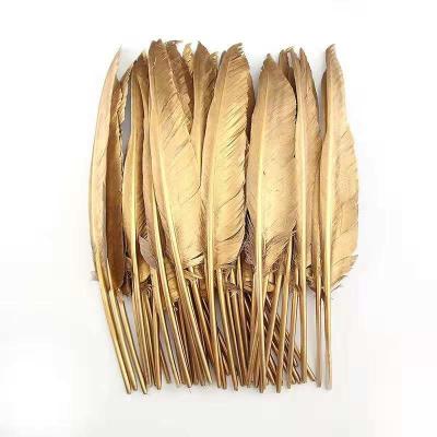 China 20-25 Cm Gold Dyed Turkey Feathers Quill Perfect For Festival Decoration for sale