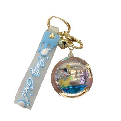 China Key Chain Creative Astronaut L085 Plastic Quicksand Acrylic Pendant Key Oil Liquid Bag Floating Key Chain for sale