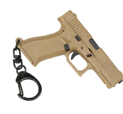 China Plush Toy z015 Glock 45 Paintball Pistol Gun Shape Weapon Model Keychain Tactical Keychain Plastic with Movable Lever and Magazine for sale