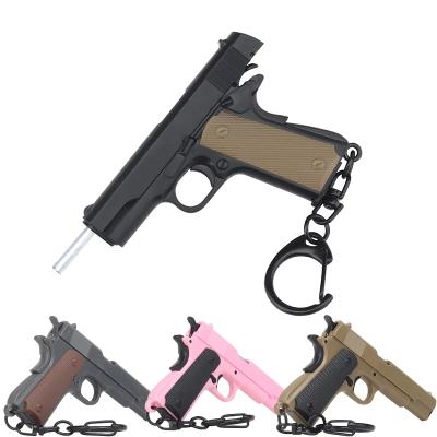 China Reduced Key Chain New 1911 Gun Keychain by 1:4 Ring Nylon Decomposable Gift plush z016 pistol gun shape model tactical weapon keychain for sale