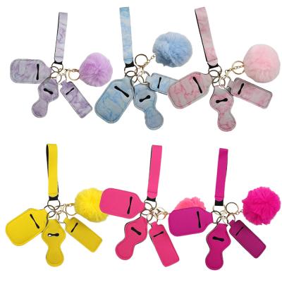 China Useful Lanyard Wristlet Key Chain Woman Self Defense Key Chain Set Pompom Bottle Opener Hand Sanitizer Holder Lip Gloss Holder for sale