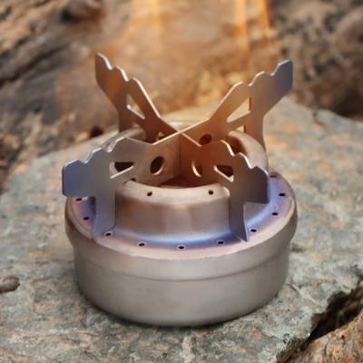 China Outdoor Camping Portable Mini Pure Titanium Alcohol Solid Liquid Stove Picnic Portable Easy Traveling Boosting Shop Camping Stove for sale