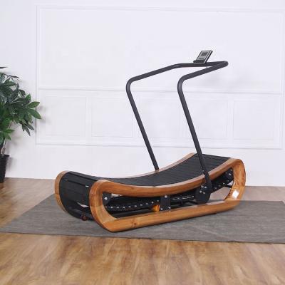 China Heavy Duty Indoor Gym Equipment Custom LOGO Non Electric Wooden Curved Body Mechanical Manual Treadmill for sale