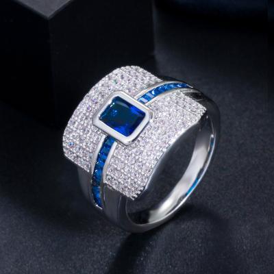 China Geometric Punk Sparkle White Gold Plated Wedding Engagement Place Promise Ring Big Blue CZ Zirconia For Women Bridal Ring for sale