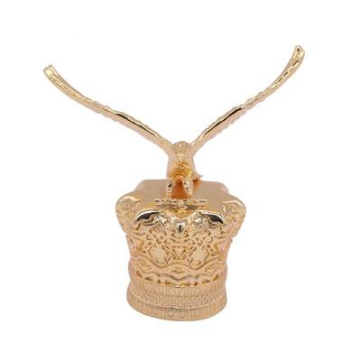 China Cap Customized Animal Shape Perfume Capsule Eagle Head Metal Zamac Perfume Cover for sale