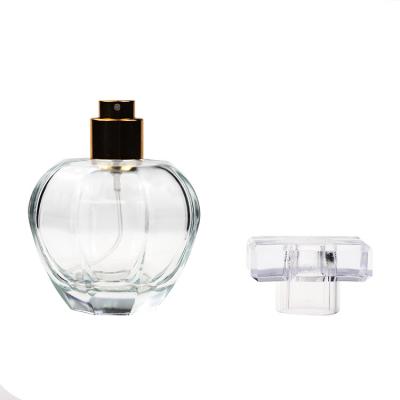 China Non Puddle New Design Apple Shape Clear Perfume Glass Bottle Hot Selling Perfume Bottles for sale