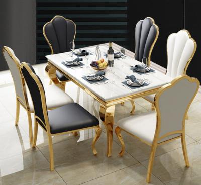 China 2022 New Fashion Modern Luxury Marble Top Dining Room Stainless Steel Dining Table 6/8/10 Seaters for sale