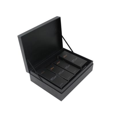 China Retail Skin Care Box Black Printing And Golden Foil With Waterproof Surface for sale