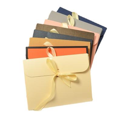 China Paperboard Envelope Custom Paper Pouch With Ribbon Closure for sale