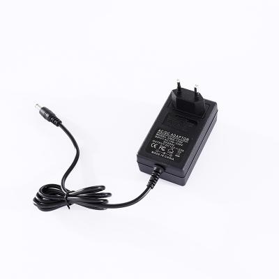 China High Efficiency 12v 2.5a 2500ma AC DC Power Supply Adapter Power Supply For LED Light AM FM Radio Toys Kids Keyboard Electronic Piano for sale