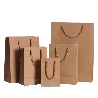 China 250gsm Recyclable Cardboard Packaging Paper Bag Thick Cardboard Paper Gift Bag With String For Shopping Clothing for sale