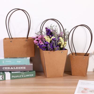 China Recyclable Paper Cardboard Paper Storage Bag Box Fresh Dry Flower Gift Bag With Handles for sale