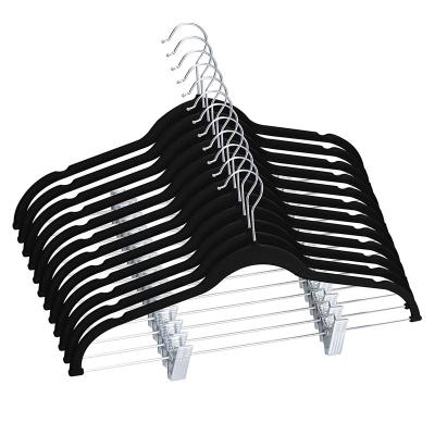 China Wholesale Modern Non Slip Metal Hangers Clothes Black Velvet Pants Hanger With Adjustable Clips for sale