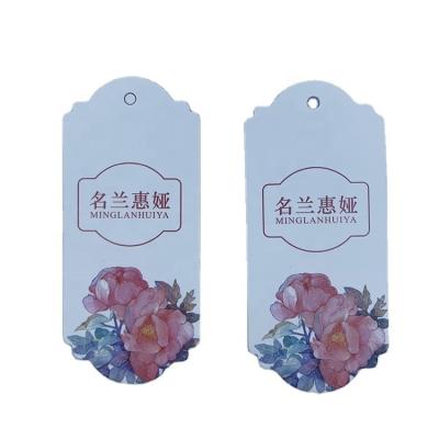 China Viable For Own Clothing Custom Logo Template Cardboard Hang Tags Circle Hang Tag Custom Printed White Rose for sale