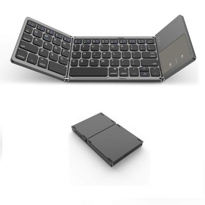 China Wireless Rechargeable Portable Ultra Thin Dual Mode Keyboard Connect With Touchpad Gray Computer Mini Wireless Foldable Keyboard for sale