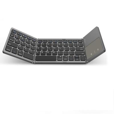 China Wireless Portable Wide Compatibility Two Mode Connect Universal Gray Color BT Foldable Wireless Keyboard for sale