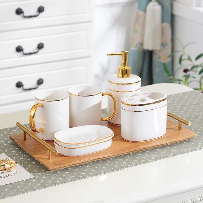 China Sustainable Nordic Luxury Gold Edge Mouthwash Cup Sets 5 Pcs Ceramic Washroom Accessories Bathroom Set For Toilet for sale