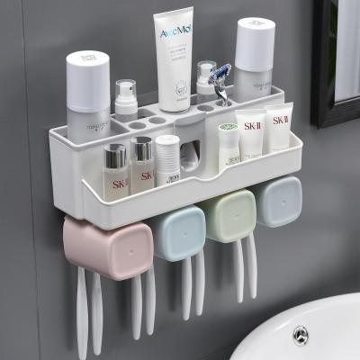 China Viable Nordic Bathroom Set Toothbrush Holder Wall Hanging No Punch Plastic Toothpaste Automatic Squeezer for sale