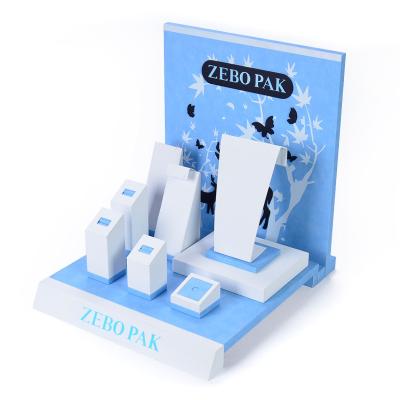 China Watch Packaging Watch Storage Display Personalized Whole Set PU Blue Leather Jewelry Display Props Ring Earring Holder Rack Necklace Bust Pendant Stand For Showcase for sale