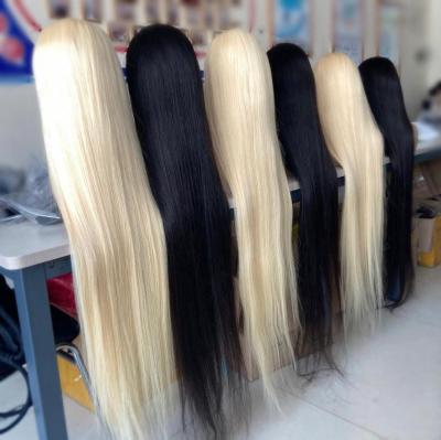 China Best quality unprocessed virgin human hair 5x5 long 32 to 40 inch 100% virgin hair wholesale hd transparent swiss lace front wig for sale