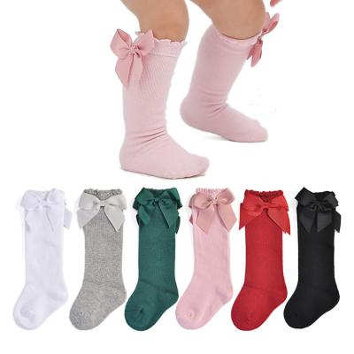 China Babies Breathable Princess Big Bow Solid Color Combed Cotton Kids Girls 0-5 Years Old Knee High Bumps Children's Baby High Socks With Bow for sale