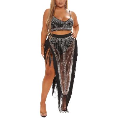 China Autumn Hot Rhinestone Spicing Women Breathable Crop Set Tops And Tassel Maxi Skirts Suit Tracksuit Two Piece Set Fitness Equipments for sale