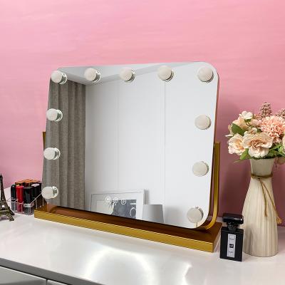 China New Arrival Lighted Metal Frame Lighted Makeup Vanity Led Hollywood Mirror for sale