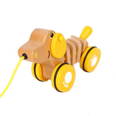 China Kid Wooden Happy Funny Toy Game Good Quality Push Toy Pulling Cartoon Dog Toddler Education Toy for sale