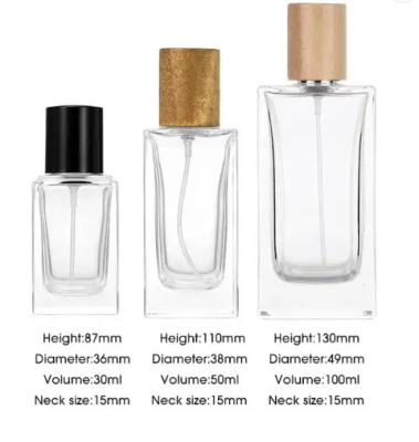 Китай 30ml 50ml 100ml Clear Glass Thick Wall Flat Shoulder Rectangle Square Perfume Bottles Empty with Mist Spray Wooden Cap O продается