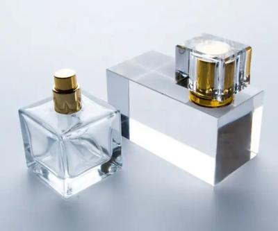 China Free sample unique 30ml clear rectangle atomizer spray perfume bottle with logo print Te koop