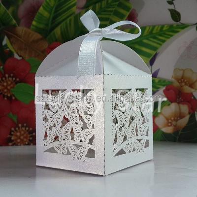 China Handmade White Butterfly Laser Cut Pearl Paper Wedding Candy Box Chocolate Favor Box Baby Shower Gift Box Christmas Newborn Gift for sale