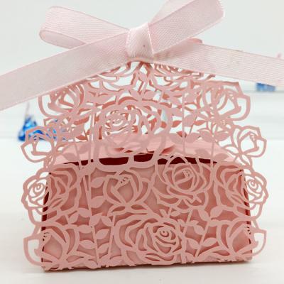 China Recyclable European Style Customized Pink Rose Laser Cut Wedding Candy Box Chocolate Delicate Wedding Favors Baby Shower Gift Box for sale