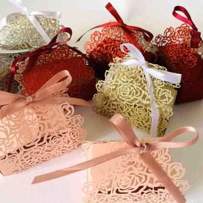 China Cheap Recyclable Rose Gold Flower Silver Glitter Laser Cut Paper Candy Box Wedding Candy Box Chocolate Favor Box Newborn Baby Gift Box for sale