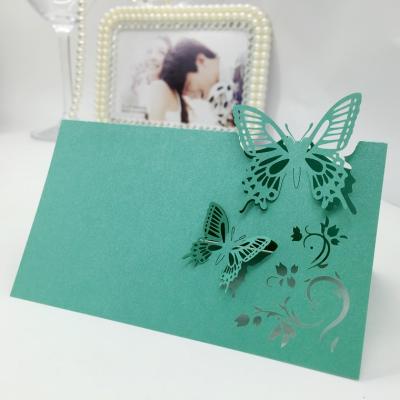 China blue laser cut paper beautiful color butterfly table card place name seats card with logo free wholesaler for wedding favor H39 for sale