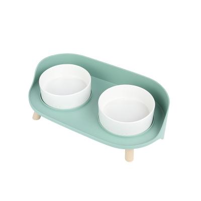 China Cat Double Bowl Protect Cervical Vertebra Cat Half Double Ceramic Dog Bowl Viable To Prevent Disturbing Water Bowl for sale