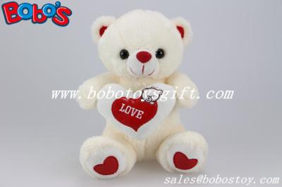 China El oso mimoso juega el oso de peluche material de la felpa más suave con la almohada roja del corazón del amor en venta