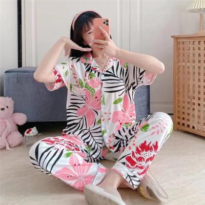 China 2022 new QUICK DRY silk female black flower thin section lapel cardigan milk pajamas home wear short-sleeved long pants set 3pcs for sale