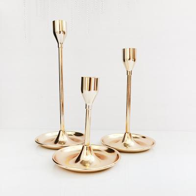 China New iron weddings table simple head candlestick romantic electroplating gold decoration for sale